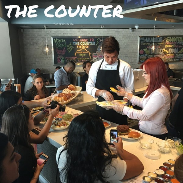 Composing of burger at The Counter